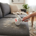 FurVeylo Pet Hair Remover Roller being used on a fur-covered sofa